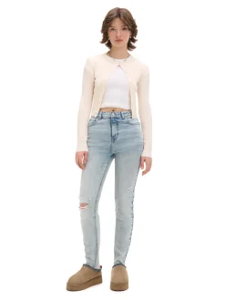 Błękitne jeansy skinny z przetarciami
