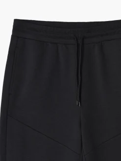 Czarne joggery slim