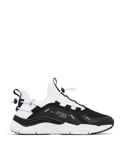 Czarno-białe sneakersy z odblaskowymi detalami