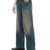 Granatowe jeansy skater z efektem sprania