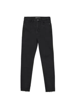 Jeansy skinny z surowym wykończeniem